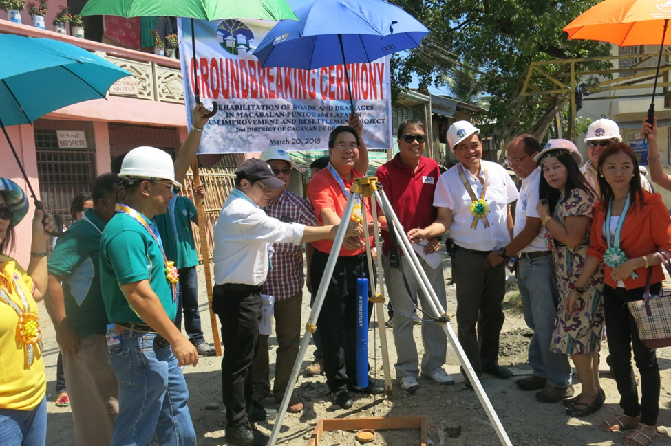 Cong. Rufus B. Rodriguez leads the capsule laying ceremony for the road concreting project in Brgy. Lapasan