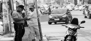 Motorist pulled over for not wearing a helmet