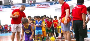 Phoenix fuel masters give  back to young basketball  players in Davao city