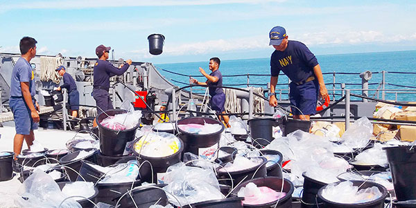 BRP Batac unloads relief packs for evacuees from Marawi