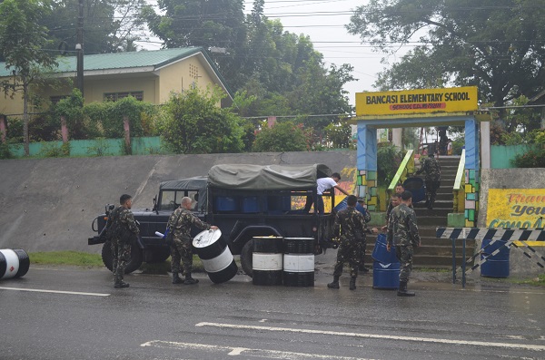 Normin Air Force turns over trash bins to schools