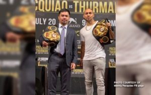 Pacquiao takes WBA super welterweight belt from Thurman