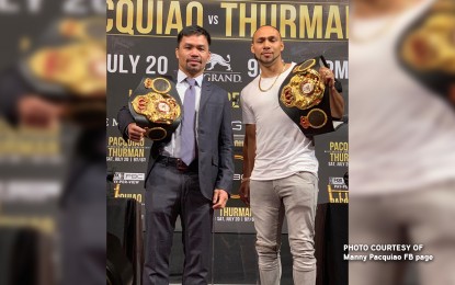 Pacquiao takes WBA super welterweight belt from Thurman