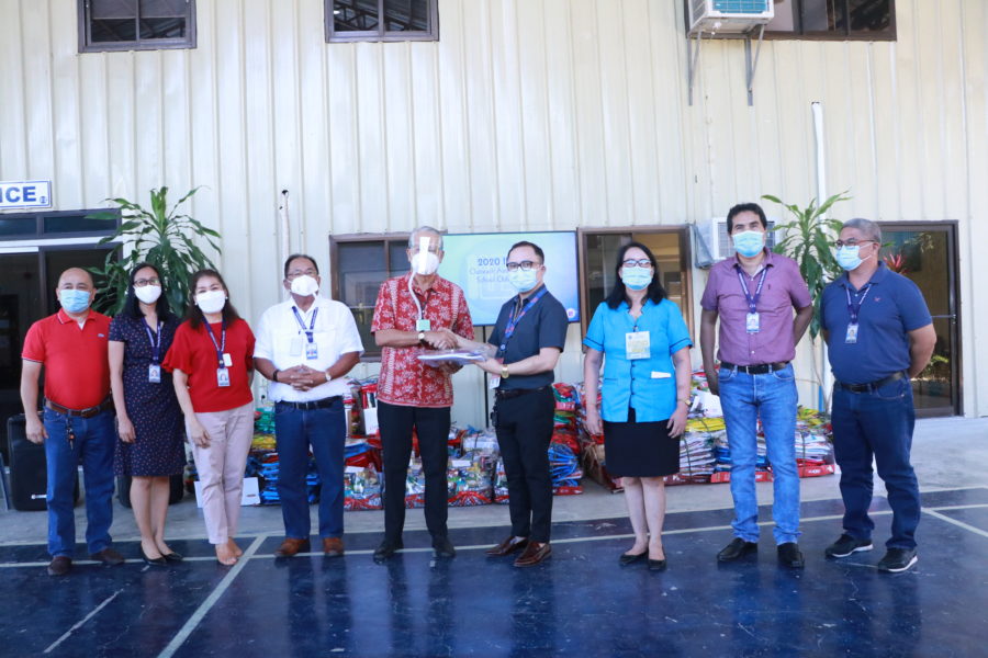 Power firm distributes school supplies to kids