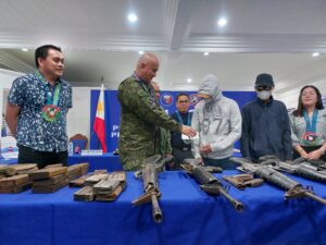Security forces unveil seized guns in anti-insurgency operation