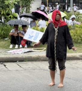 Aca detained briefly for protest art during INC ‘peace’ rally