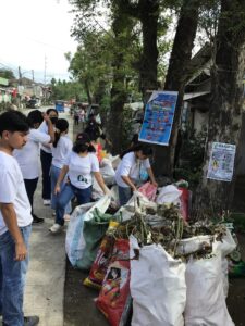 Students, volunteers lead canal clean-up in Oro