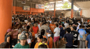 Welfare dep’t distributes flood aid in Camaman-an