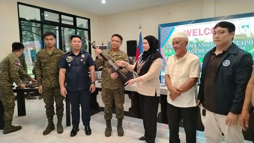 Munai residents trade weapons for safety
