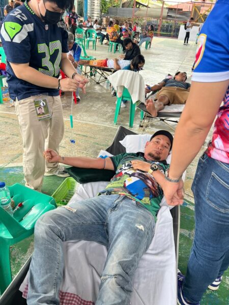 Eagle Alene Valencia and NMR-19 volunteers participating in a blood donation drive in Barangay Tablon, Cagayan de Oro.