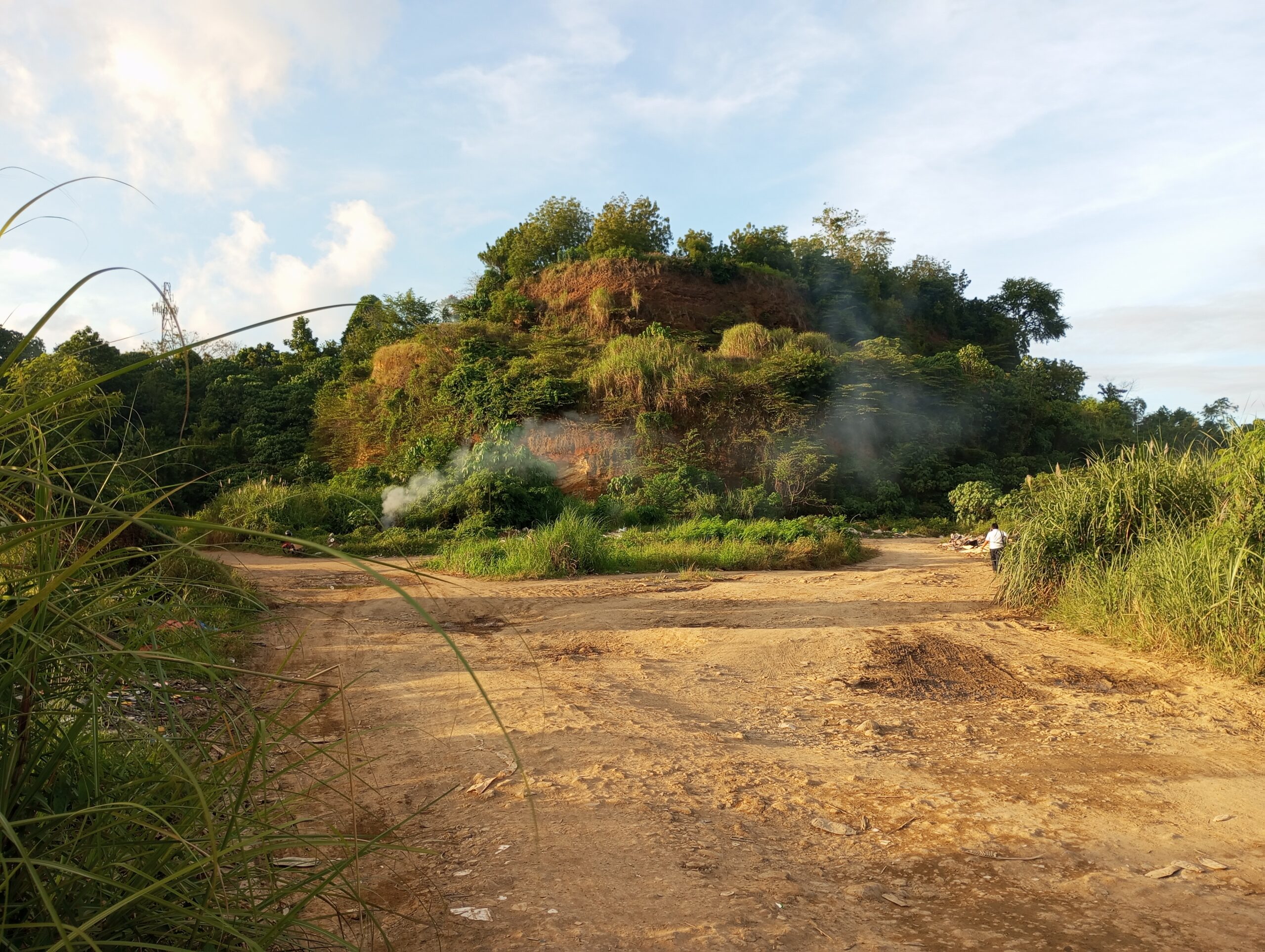 Piles of unregulated garbage and household waste at an illegal dumping site along Bajas Road in Cagayan de Oro City.
