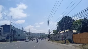 Wide shot of nearly empty highways in Baloy and Tablon, Cagayan de Oro, showing light traffic during the 2026 Holy Week as rising fuel prices discourage travel.