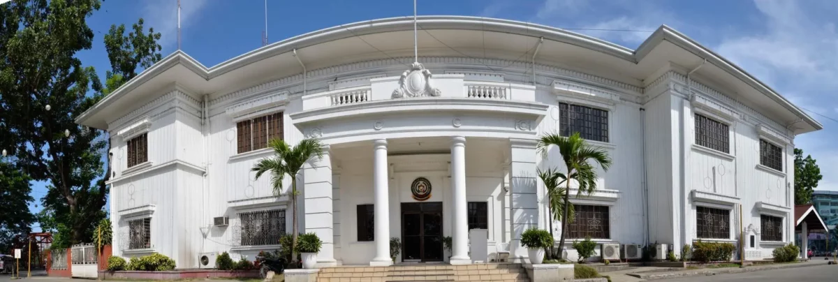 Exterior facade of Cagayan de Oro City Hall, where Mayor Rolando Uy has implemented a four-day compressed workweek for energy conservation.