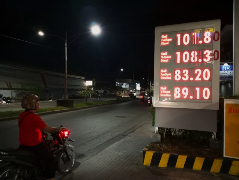 A motorela driver in Cagayan de Oro navigating local traffic during the implementation of the new fuel-based fare matrix.