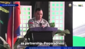 Col. Anselmo Ty of the 590th Air Base Group speaking at the Cagayan de Oro City Hall flag-raising ceremony regarding US military training.