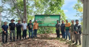FDC Misamis representative Manuel Kionisala with CMU researchers and Sambulawan officials at a carbon mapping site in El Salvador City, Misamis Oriental.
