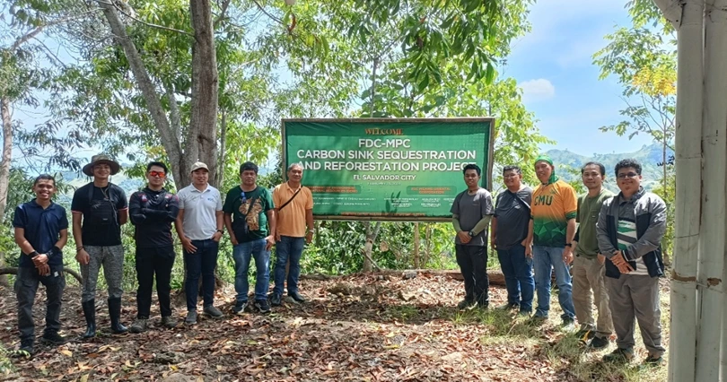FDC Misamis representative Manuel Kionisala with CMU researchers and Sambulawan officials at a carbon mapping site in El Salvador City, Misamis Oriental.