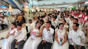 105 couples during the Feb-Ibig Kasalan ng Bayan 2026 mass wedding ceremony at Robinsons Mall Atrium in Iligan City.