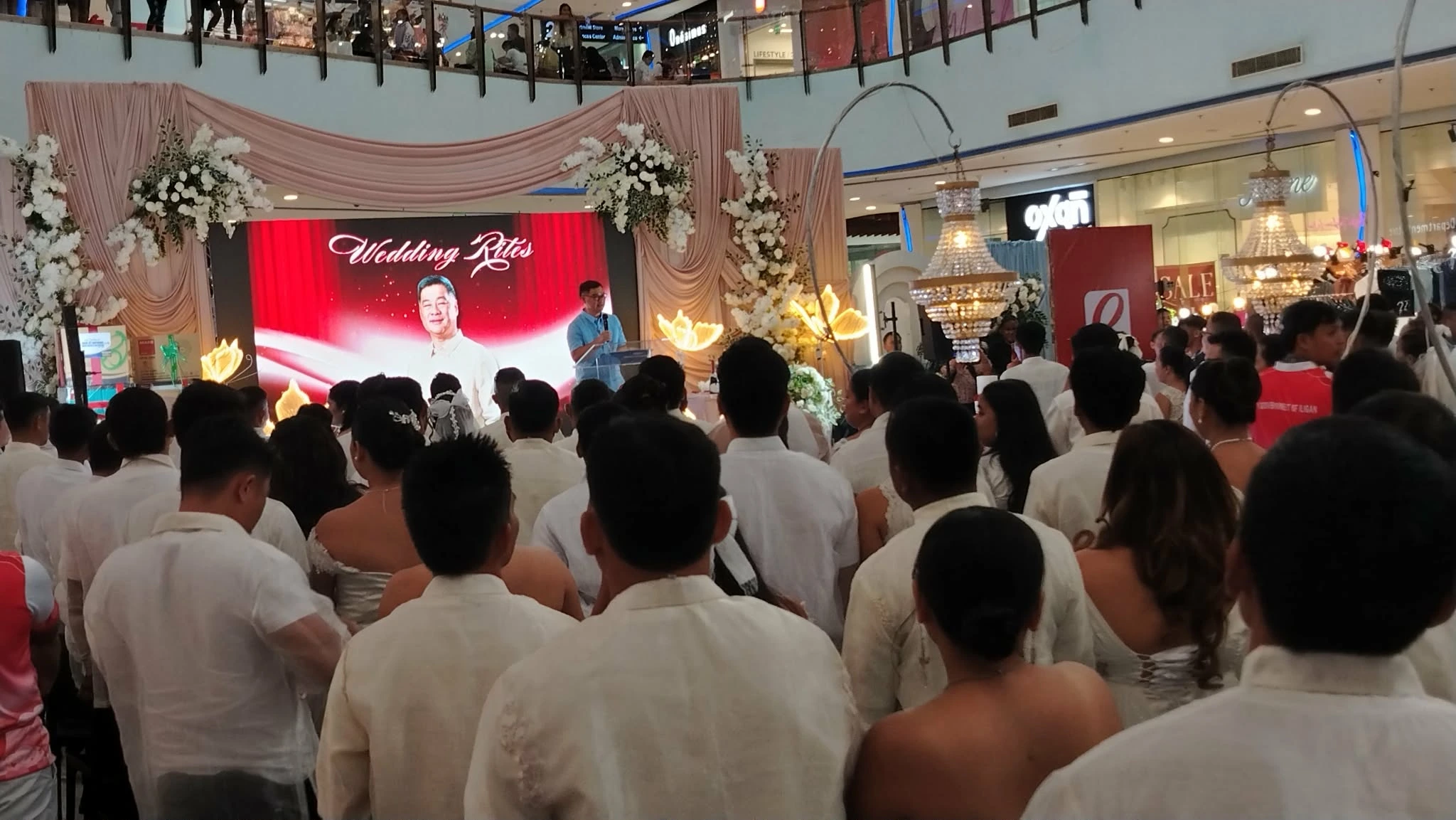 Iligan City Mayor Frederick W. Siao officiating the Feb-Ibig Kasalan ng Bayan 2026 mass wedding for 105 couples.