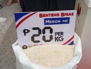 Low-income residents in Villanueva, Misamis Oriental, queuing for subsidized NFA rice at 20 pesos per kilo.
