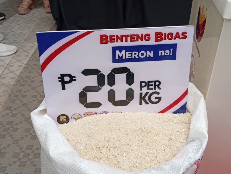 Low-income residents in Villanueva, Misamis Oriental, queuing for subsidized NFA rice at 20 pesos per kilo.