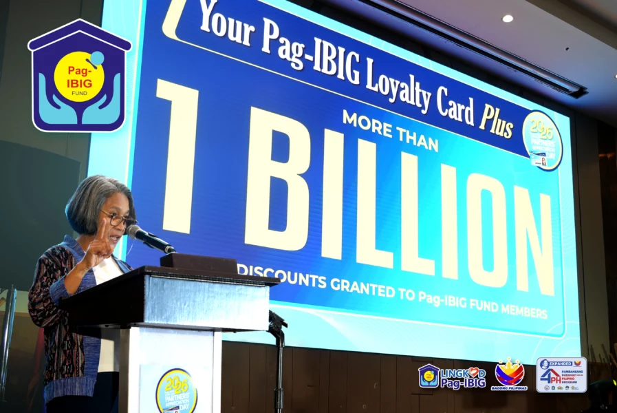 A Pag-IBIG Loyalty Card Plus being held or displayed, representing over 1 billion pesos in discounts granted to Filipino members.