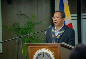 Atty. Sonny Matula, president of the Federation of Free Workers, addresses a labor forum at the University of the Philippines Diliman regarding the national energy emergency.