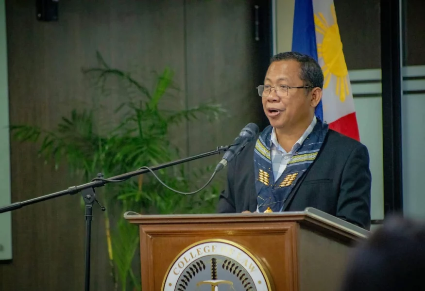 Atty. Sonny Matula, president of the Federation of Free Workers, addresses a labor forum at the University of the Philippines Diliman regarding the national energy emergency.