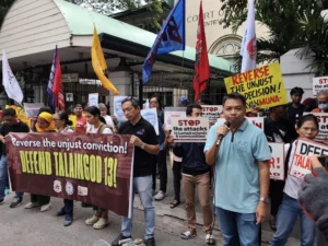 BAYAN Secretary-General Raymond Palatino speaking at a Defend Talaingod 13 event to demand accountability for human rights violations under the Marcos Jr. administration.
