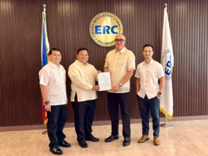FDC Green Energy Corp CEO Juan Eugenio Roxas receiving the ERC Certificate of Compliance for the 20.774-MWp Misamis Solar Power Project in Tagoloan, Misamis Oriental.