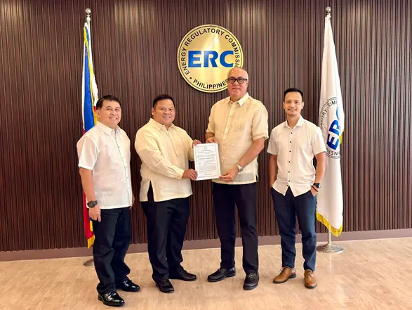 FDC Green Energy Corp CEO Juan Eugenio Roxas receiving the ERC Certificate of Compliance for the 20.774-MWp Misamis Solar Power Project in Tagoloan, Misamis Oriental.