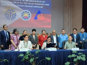Labor groups from the Federation of Free Workers and Nagkaisa Labor Coalition celebrating the signing of the Implementing Rules and Regulations for the Labor Education Act, or Republic Act No. 11551.