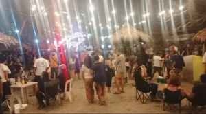 Large crowd filling the beach venue on the opening night of the OpolFrolic Music Festival in Opol, Misamis Oriental.