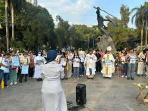 FFW President Atty. Sonny Matula and civil society leaders gathering at Our Lady of Remedies Church in Malate to demand a wage hike and fuel tax suspension.