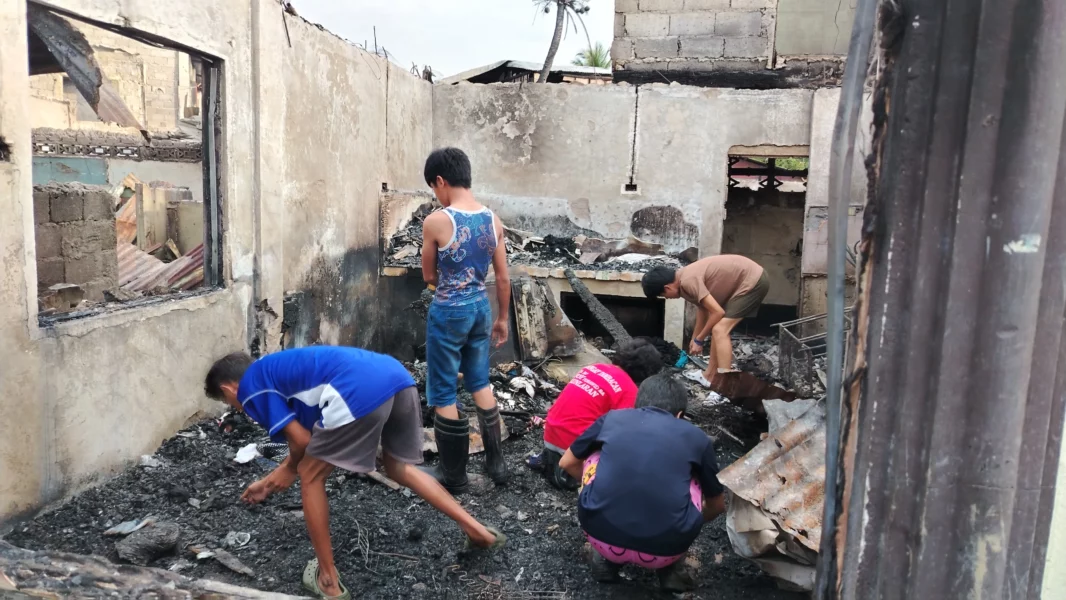 The charred remains and debris of houses destroyed by a fire in Purok 2A, GK Rainbow Village, Barangay Tambacan, Iligan City.