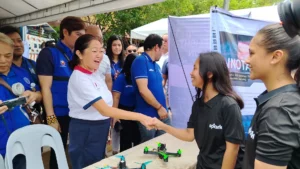 First Lady Liza Araneta-Marcos interacting with medical volunteers and local patients during the LAB for All healthcare deployment in Cagayan de Oro City.