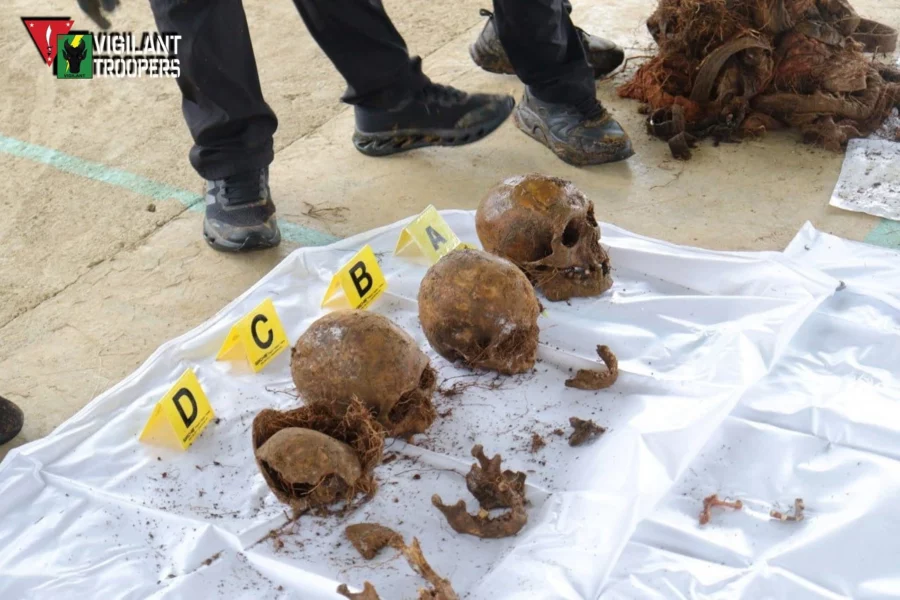Joint military and police operatives exhuming skeletal remains in Barangay Dilimbayan, Maguing, Lanao del Sur.