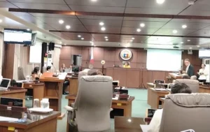 Cagayan de Oro 2nd District Councilor Maximo Rodriguez speaking at a podium during a City Council session.