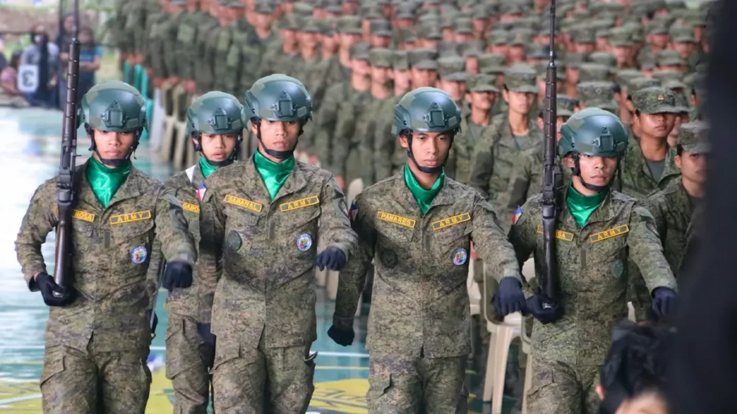 Reserve Officers Training Corps cadets march in precise military formation during an advance academic phase graduation ceremony in Malaybalay City, Bukidnon.