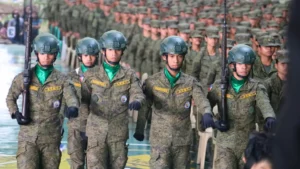 Reserve Officers Training Corps cadets march in precise military formation during an advance academic phase graduation ceremony in Malaybalay City, Bukidnon.