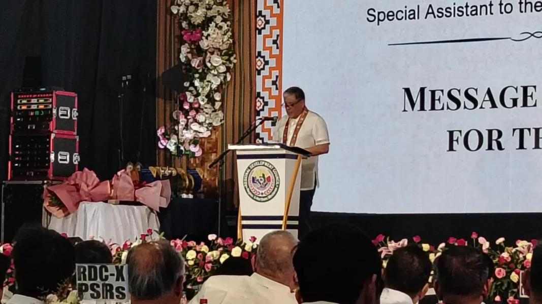 Special Assistant to the President Anton Lagdameo Jr. stands at a podium, speaking to attendees during the 145th Regional Development Council-10 Full Council Meeting.