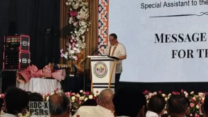 Special Assistant to the President Anton Lagdameo Jr. stands at a podium, speaking to attendees during the 145th Regional Development Council-10 Full Council Meeting.