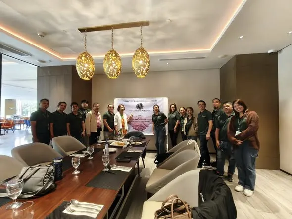 Labor representatives from the Federation of Free Workers (FFW) and Vitarich Corporation signing a Collective Bargaining Agreement (CBA) at the Acacia Hotel in Davao City.