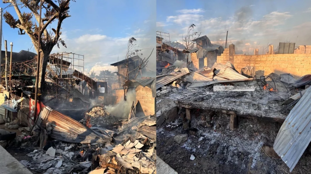 Thick gray smoke rising from the charred, skeletal remains of tightly packed wooden homes in Sitio Gaabucayan, Barangay Lapasan, Cagayan de Oro City.