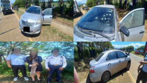 A four-panel photo collage detailing a broad-daylight highway robbery in Manolo Fortich, Bukidnon. Panel one shows the front of a silver Toyota Vios sedan on the grassy shoulder near a concrete canal with police tape; panel two is a close-up of the windshield riddled with eight bullet holes and a shattered driver's window; panel three shows two bank employees and a security guard standing roadside with blurred faces; panel four displays a rear-quarter profile of the car at the crime scene w