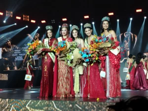 The top five winners of Miss Philippines Earth 2026 stand together on stage in evening gowns, crowns, and sashes during the national coronation night.