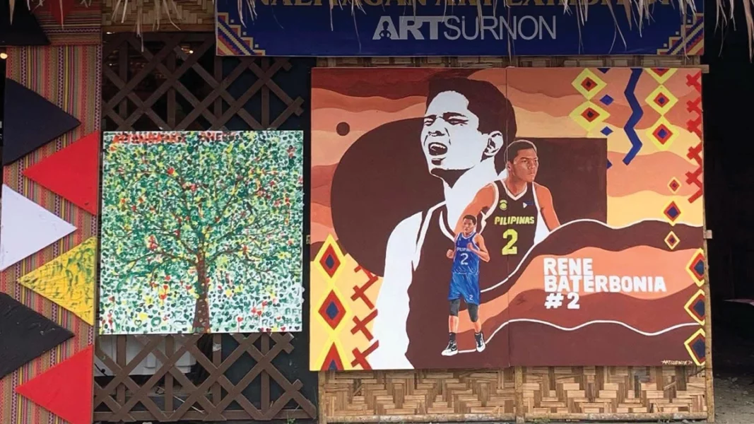 A mural depicting Agusan del Sur basketball icon Rene Baterbonia with indigenous art at the Naliyagan Art Exhibition.