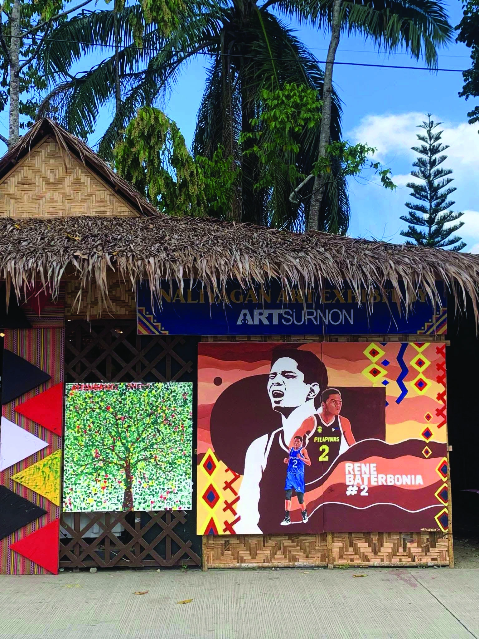 Mural of basketball icon Rene Baterbonia featuring indigenous motifs at the Naliyagan Art Exhibition in Agusan del Sur.