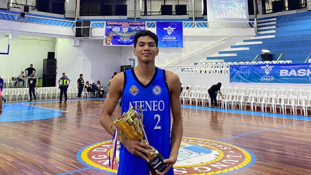 A portrait photograph of 19-year-old basketball player Rene Clert Baterbonia, the 2025 Palarong Pambansa Most Valuable Player from Agusan del Sur.