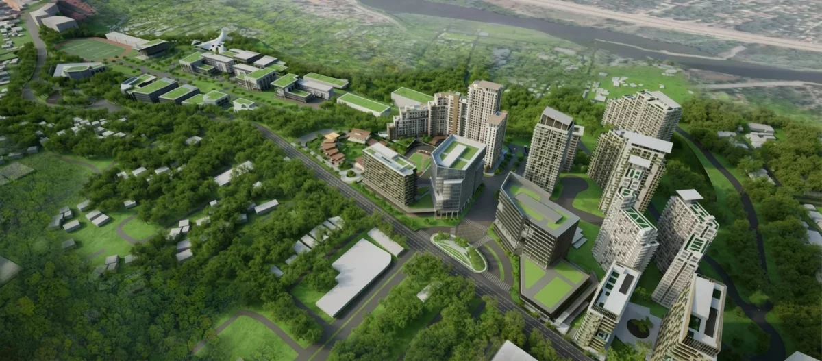 An aerial digital illustration of the proposed Manresa Town township project in uptown Cagayan de Oro City, featuring clusters of modern high-rise buildings, green rooftops, and surrounding forested areas.